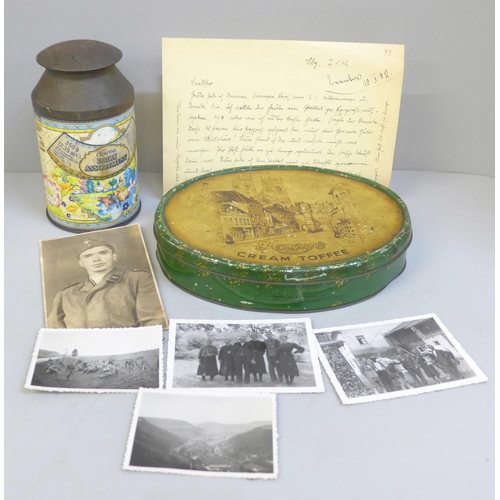 674 - An original German letter from WWII with photographs and two tins