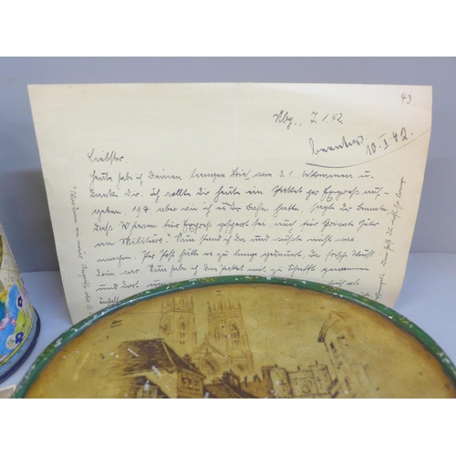 674 - An original German letter from WWII with photographs and two tins