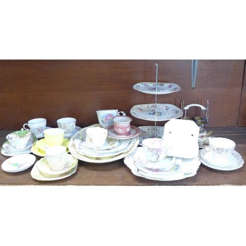 675 - A collection of tea trios including Royal Albert, Paragon, a Midwinter Stylecraft three tier cake st... 