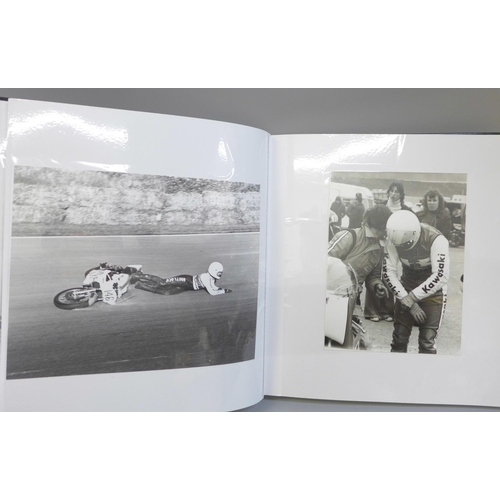 676 - An album containing Motorcycle Grand Prix and Motocross black and white photographs, including Barry... 