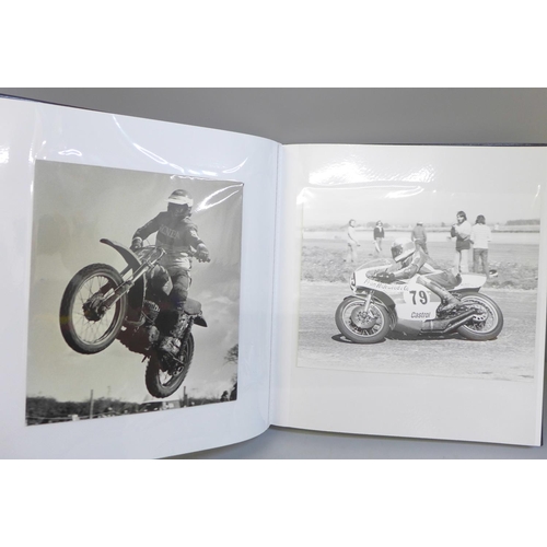 676 - An album containing Motorcycle Grand Prix and Motocross black and white photographs, including Barry... 