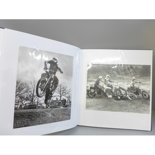 676 - An album containing Motorcycle Grand Prix and Motocross black and white photographs, including Barry... 