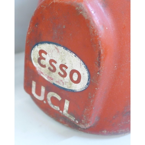 680 - A BP Energol motor oil bottle and an Esso UCL oil dispenser