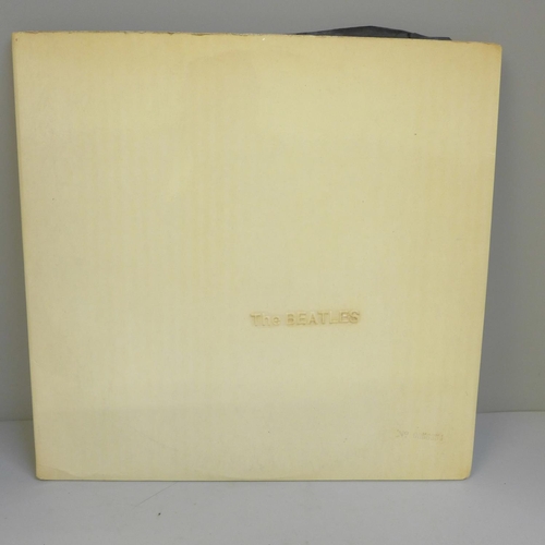 681 - The Beatles White Album, no. 0056854, with original black inner sleeves, poster and four photographs