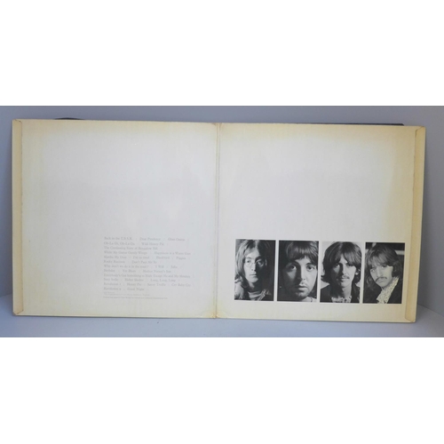 681 - The Beatles White Album, no. 0056854, with original black inner sleeves, poster and four photographs