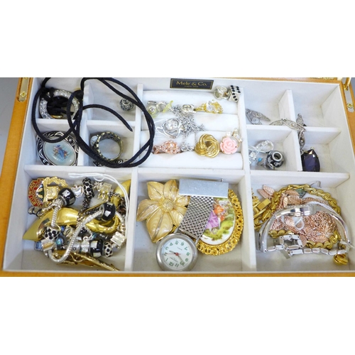 685 - A case of costume jewellery and wristwatches