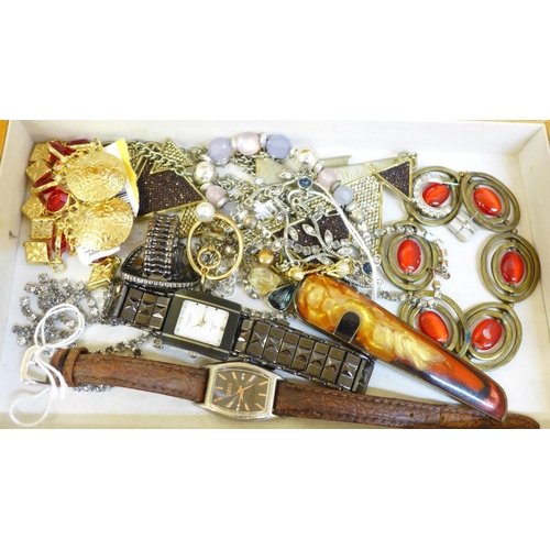 685 - A case of costume jewellery and wristwatches