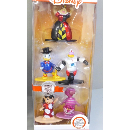 694 - A QE11 Trooping The Colour First Day Cover, a Sun toy figures set of Disney Pixar characters and a D... 