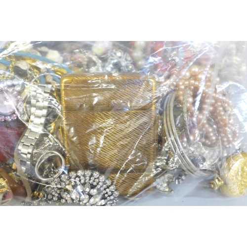 706 - Two bags of costume jewellery