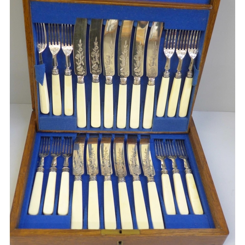 707 - A Joseph Rogers & Co. cased set of twelve pastry knives and forks