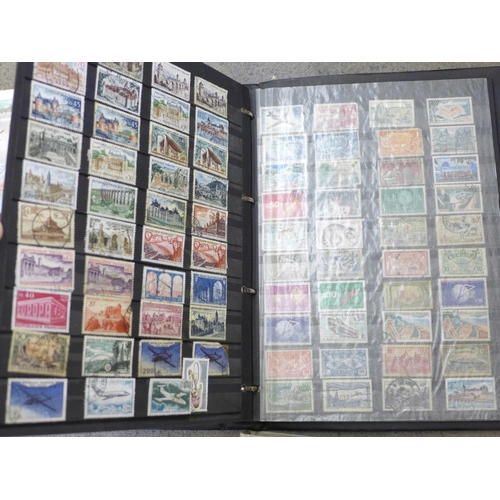 711 - Four albums of used Foreign stamps