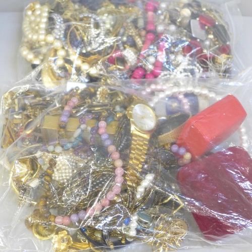 713 - Two bags of costume jewellery