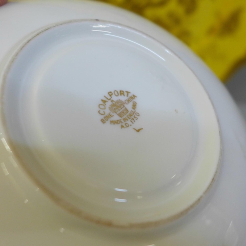 722 - A Coalport yellow and gold Cairo bird trio and dinner plate