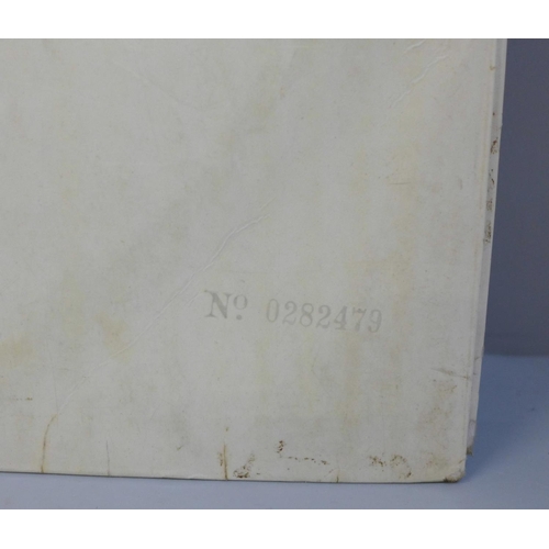 725 - The Beatles White Album, no. 0282479, with original black inner sleeves, poster and four photographs