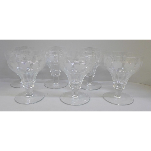 727 - A set of six large glasses with etched decoration of grapes and vines