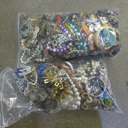 749 - Two bags of costume jewellery