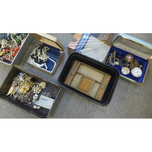 751 - A box of costume jewellery