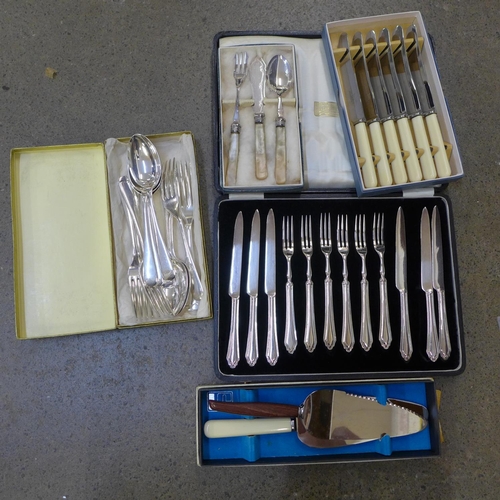 753 - A cased set of silver plated pastry knives and forks and other silver plated cutlery