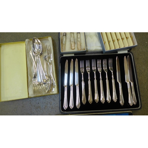 753 - A cased set of silver plated pastry knives and forks and other silver plated cutlery