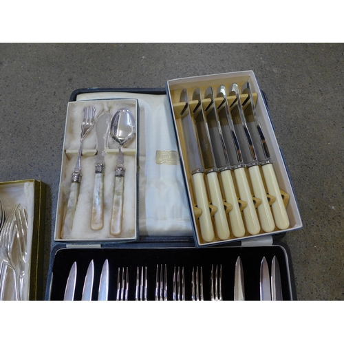 753 - A cased set of silver plated pastry knives and forks and other silver plated cutlery