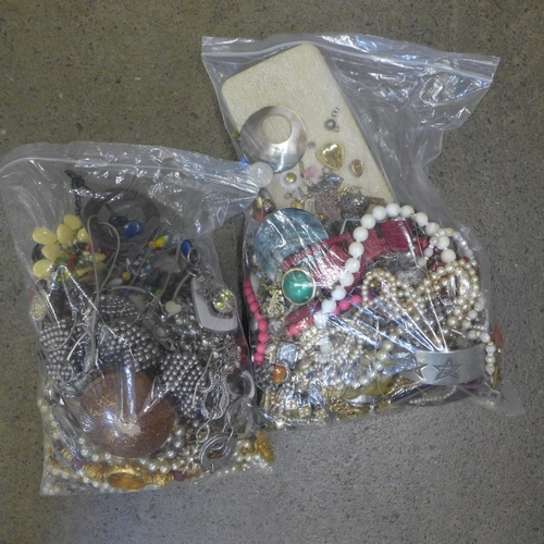 764 - Two bags of costume jewellery