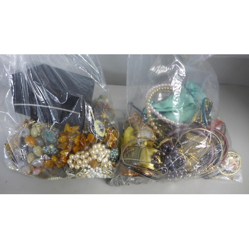 769 - Two bags of costume jewellery