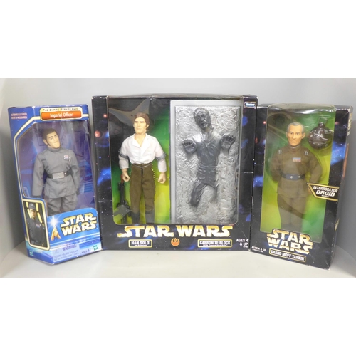 787 - Three boxed Star Wars figures; Hans Solo as Prisoner, Carbonite block, The Empire Strikes Back Imper... 