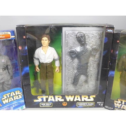 787 - Three boxed Star Wars figures; Hans Solo as Prisoner, Carbonite block, The Empire Strikes Back Imper... 