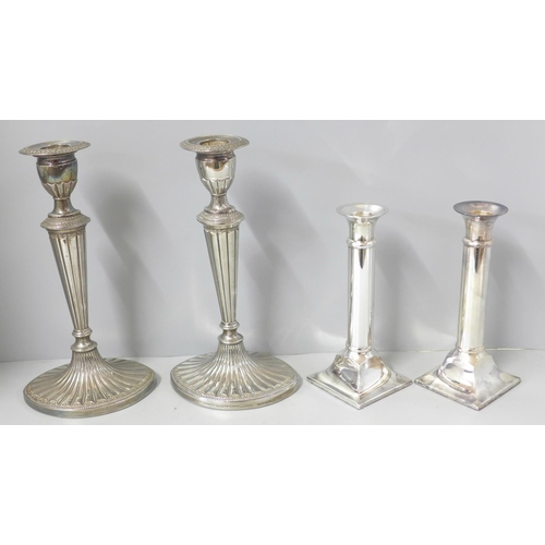 803 - A pair of Parks of London silver plated candlesticks and one other pair of silver plated candlestick... 