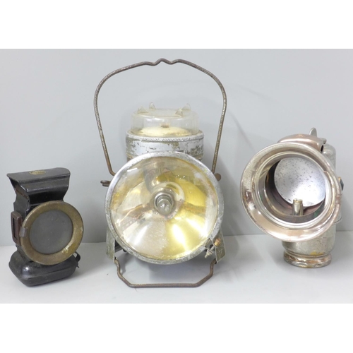 806 - A vintage Lucas Calica lamp, another early lamp and a railway lamp