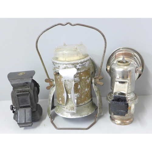 806 - A vintage Lucas Calica lamp, another early lamp and a railway lamp