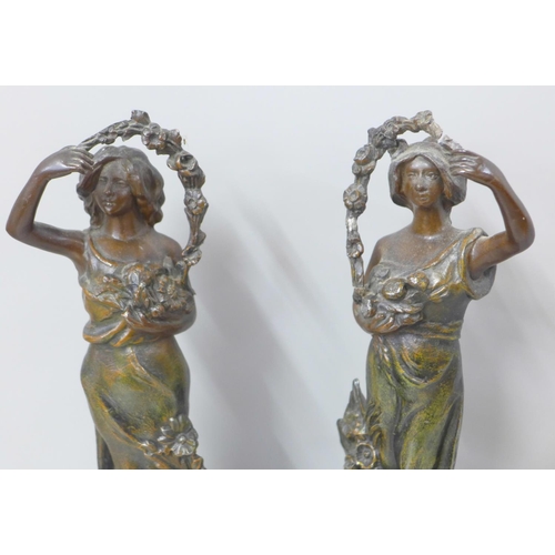 811 - A pair of painted spelter figures of ladies, after Ruchot, one a/f, 41cm