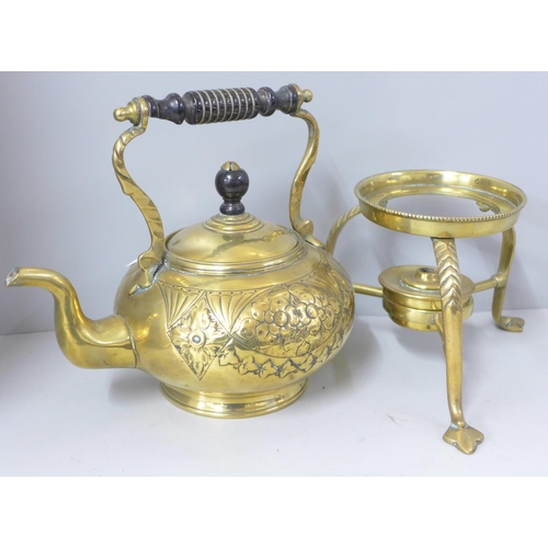 815 - An Arts & Crafts brass spirit kettle and stand