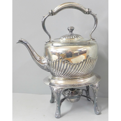 821 - A silver plated spirit kettle and stand