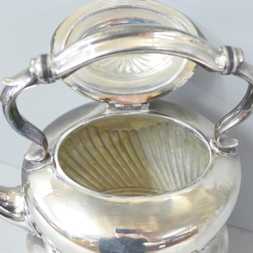 821 - A silver plated spirit kettle and stand