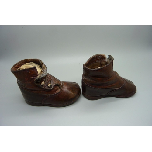 848 - A pair of late 19th Century children's leather shoes