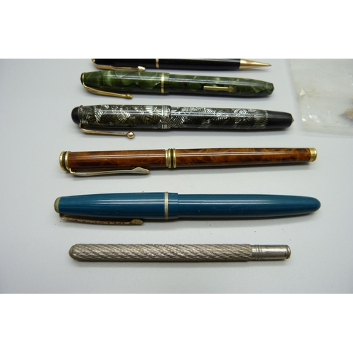 855 - Eleven 18ct rolled gold pen nibs, four pens with 14ct gold nibs, one lacking top, etc.