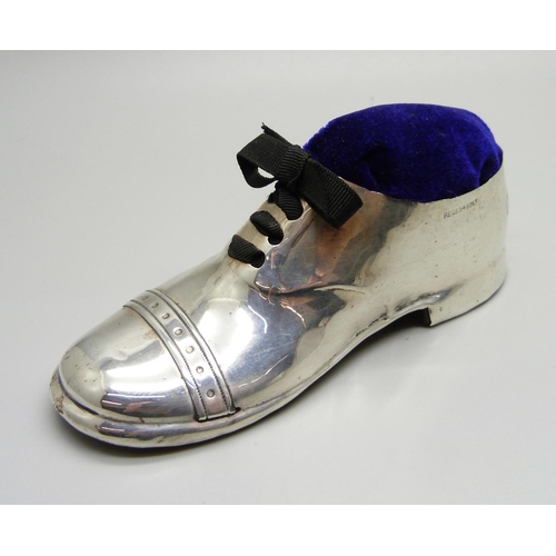 863 - An antique novelty silver shoe pin cushion, Chester 1908, 12.5cm