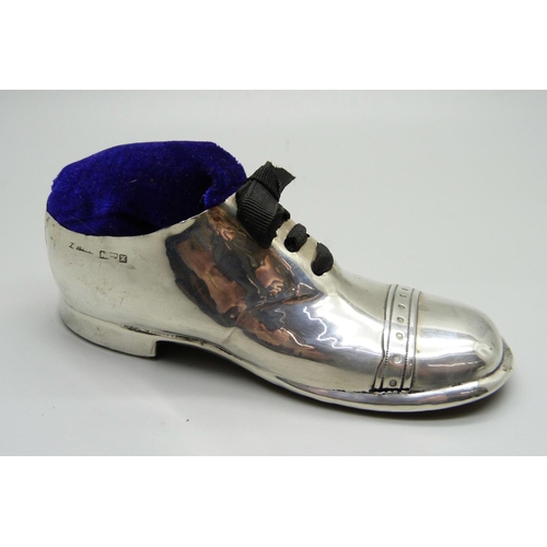 863 - An antique novelty silver shoe pin cushion, Chester 1908, 12.5cm