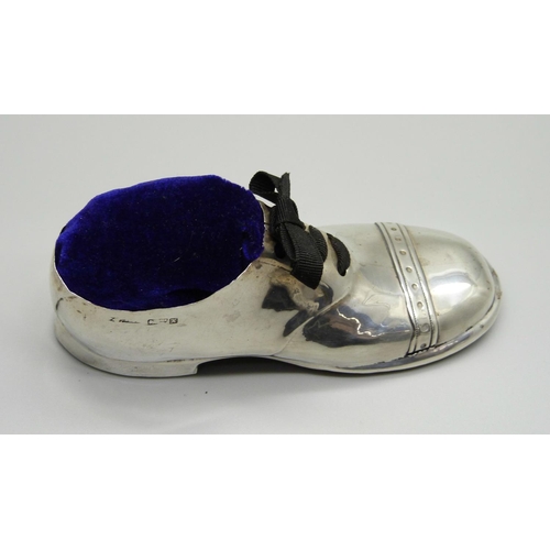 863 - An antique novelty silver shoe pin cushion, Chester 1908, 12.5cm