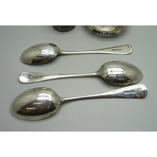 868 - Three silver spoons, a silver spoon, a/f, a pierced silver dish, 196g