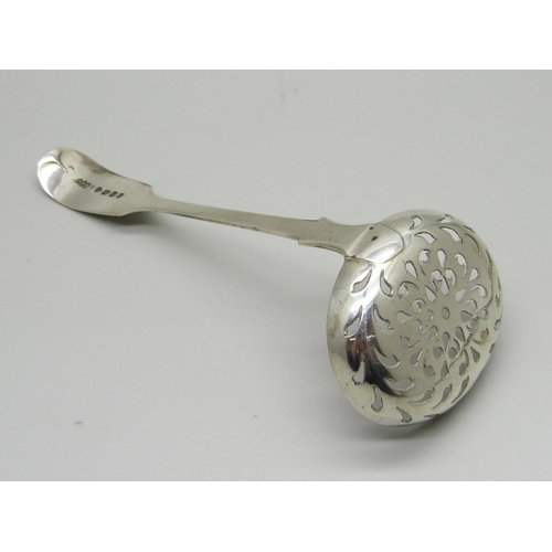 869 - A Victorian silver sifter ladle, London 1857, 28g