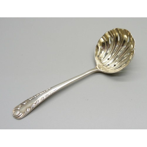 874 - A small silver sifter ladle, Sheffield 1895, 21g