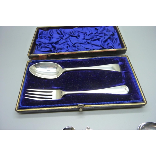 877 - A silver fork and spoon, case a/f, and five other silver spoons, 91g