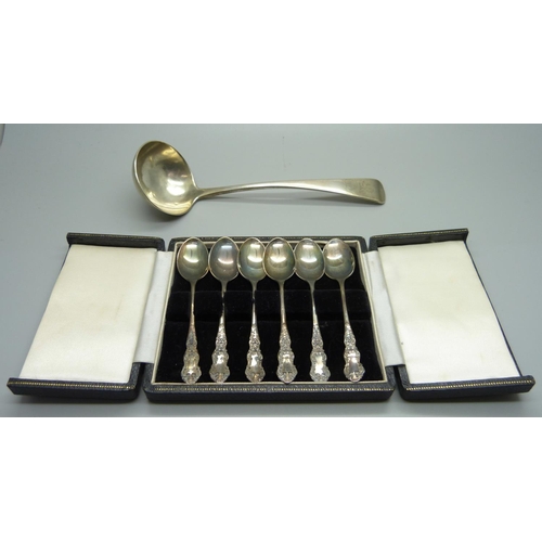 878 - A silver ladle and a cased set of six silver coffee spoons, 102g