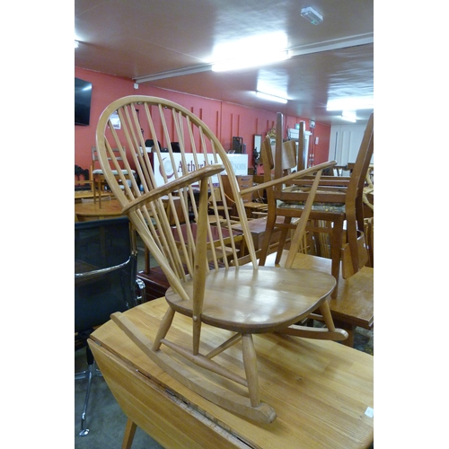 102 - An Ercol Blonde elm and beech 315 model rocking chair