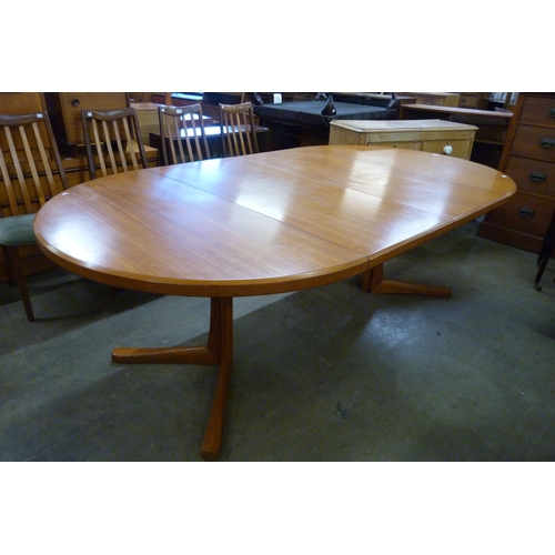 117A - A Danish teak extending dining table