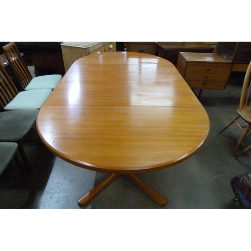 117A - A Danish teak extending dining table