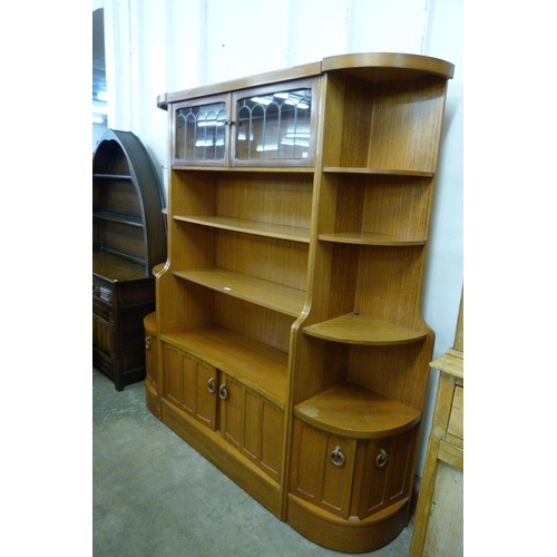 121 - A teak wall unit