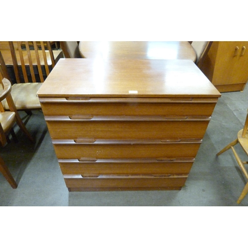 122 - A teak chest of drawers